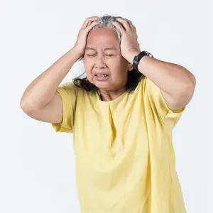 elderly-woman-pose-with-feeling-painful-her-head